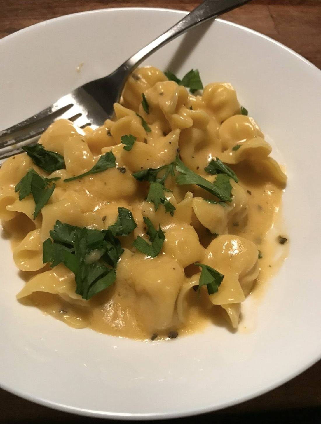 Tortellini in a butter sauce with parsley